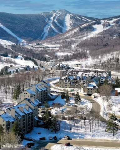 Winter exterior view of a condo complex near the slopes at the Killington ski resort in Vermont.