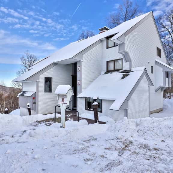 Ski-In/Ski-Out Sunrise Village Condo | 2BR, Fireplace, Pool - Image 1